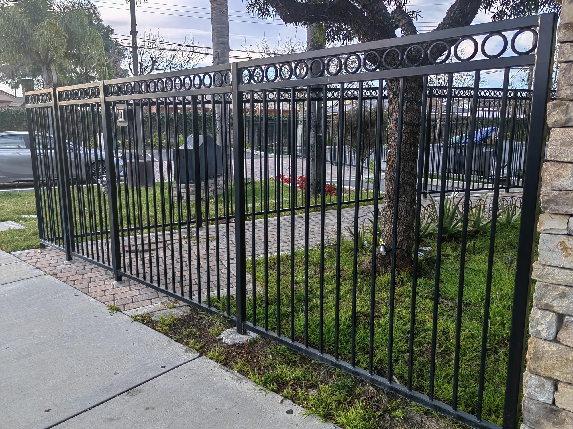 Person standing in a factory with machinery in the background