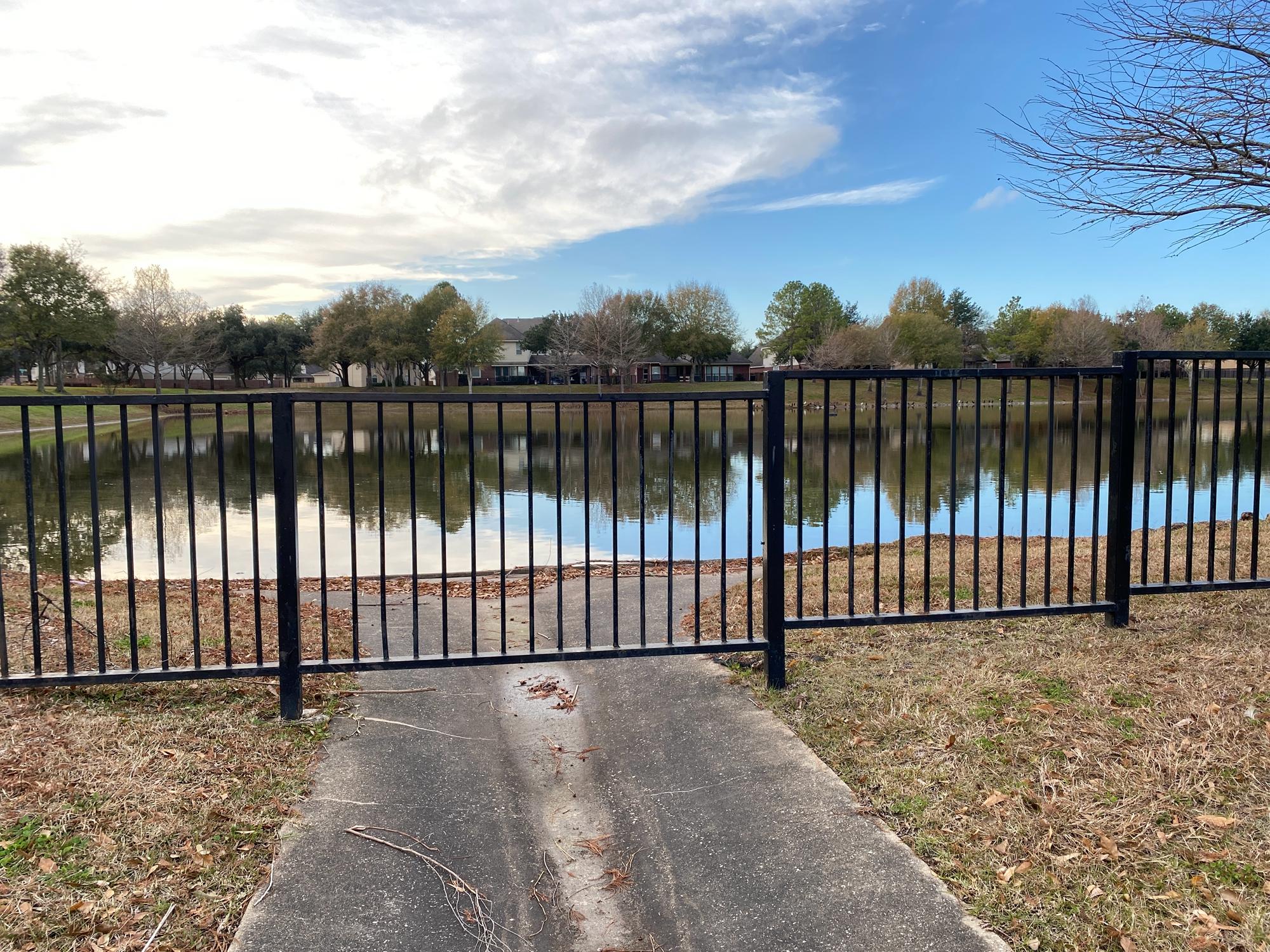 Person standing in a factory with machinery in the background