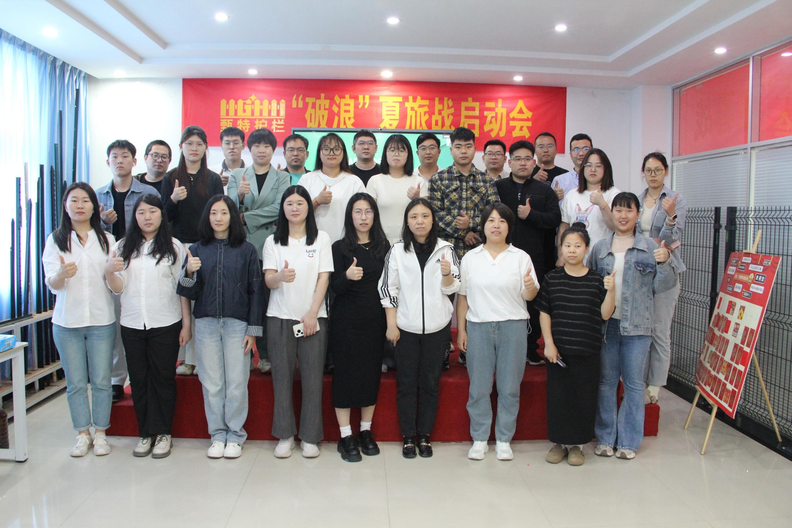 Person standing in a factory with machinery in the background