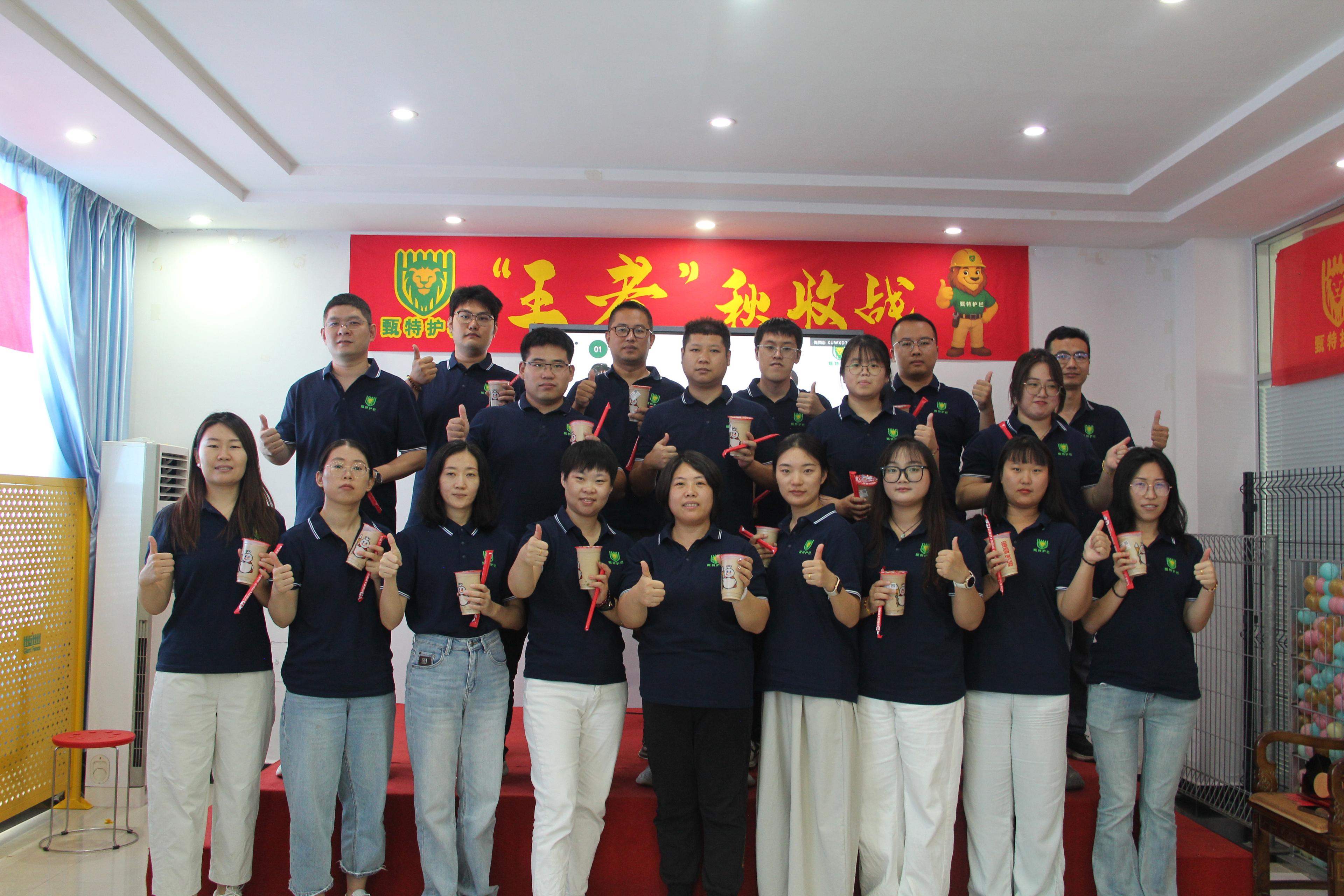 Person standing in a factory with machinery in the background