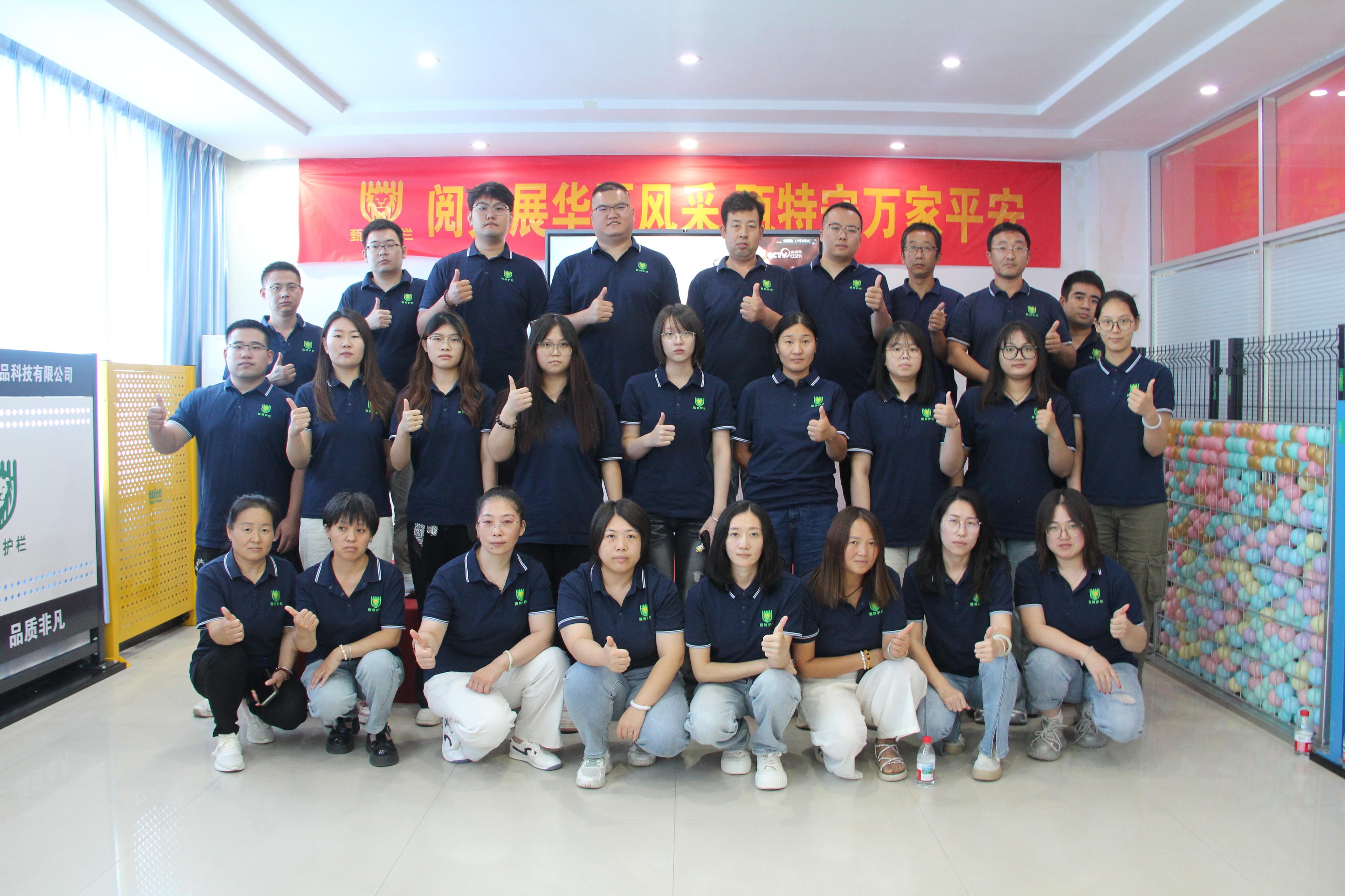 Person standing in a factory with machinery in the background