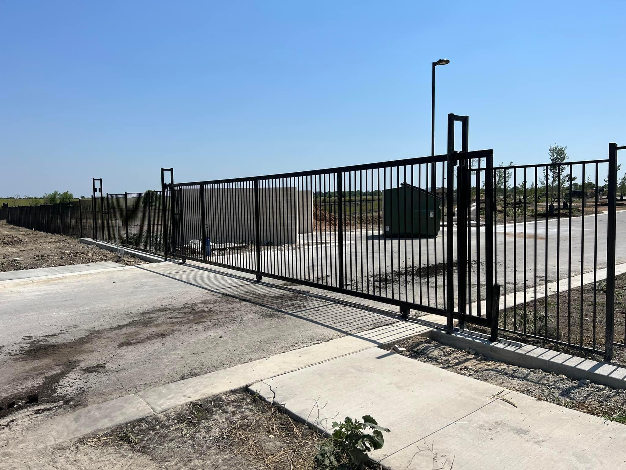 Person standing in a factory with machinery in the background