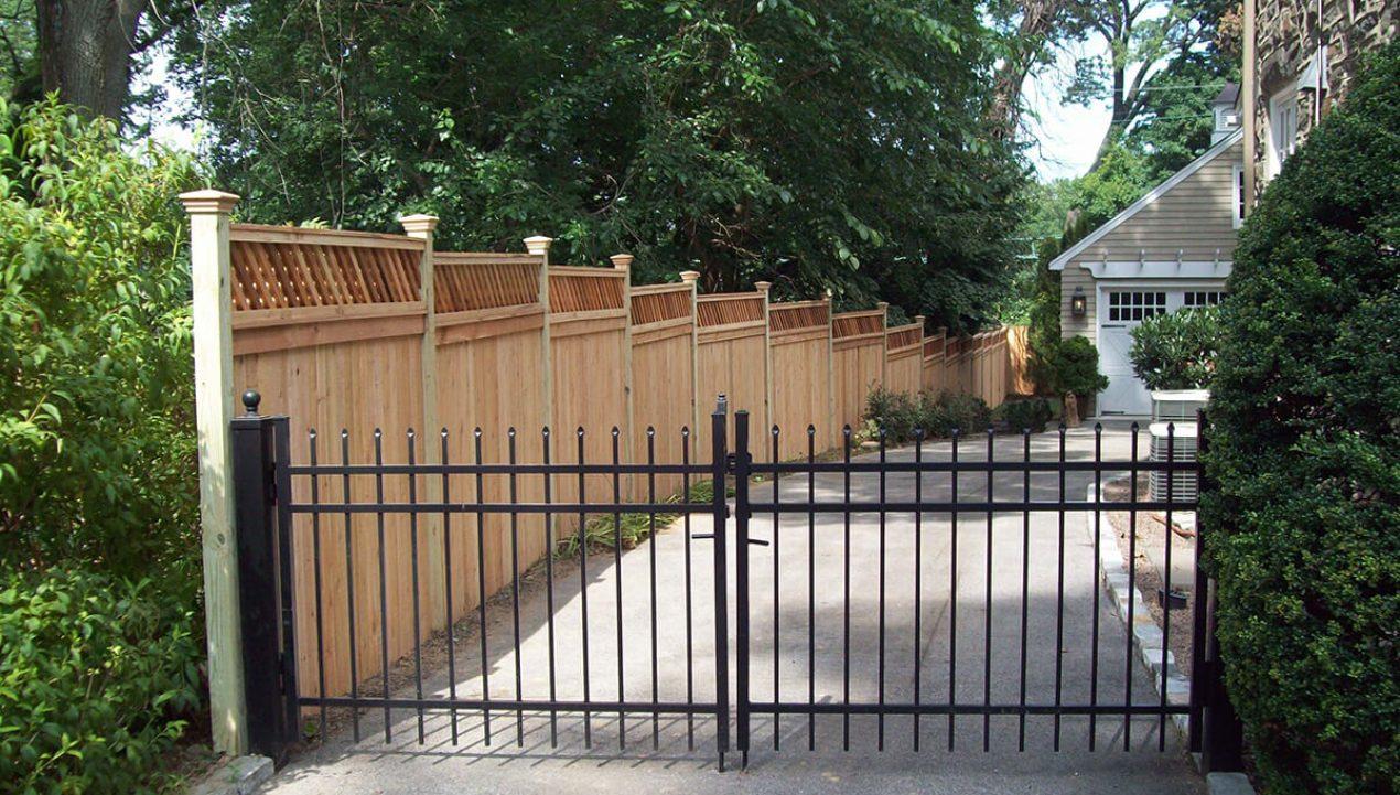 Person standing in a factory with machinery in the background