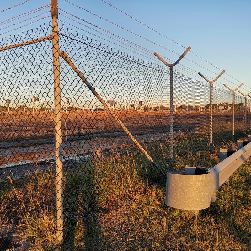 Galvanized chain wrap fence